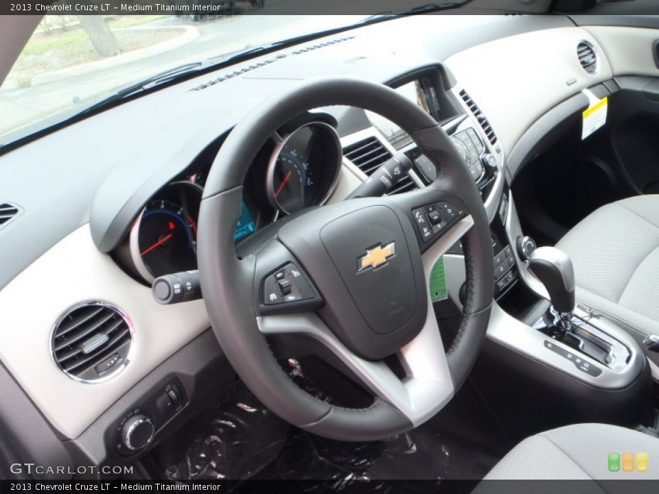 Medium Titanium Interior Steering Wheel for the 2013 Chevrolet Cruze LT #80845483