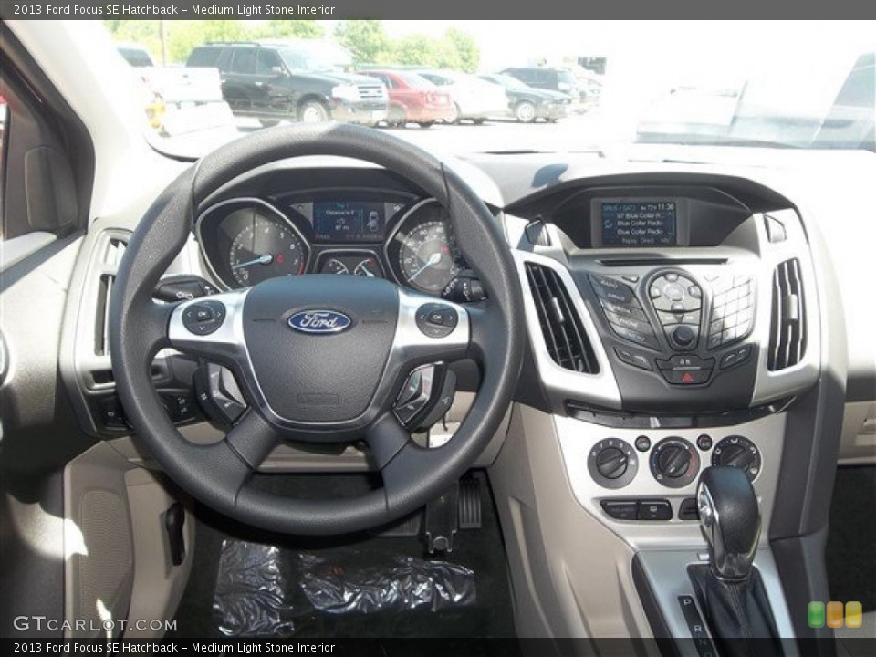 Medium Light Stone Interior Dashboard for the 2013 Ford Focus SE Hatchback #80847365