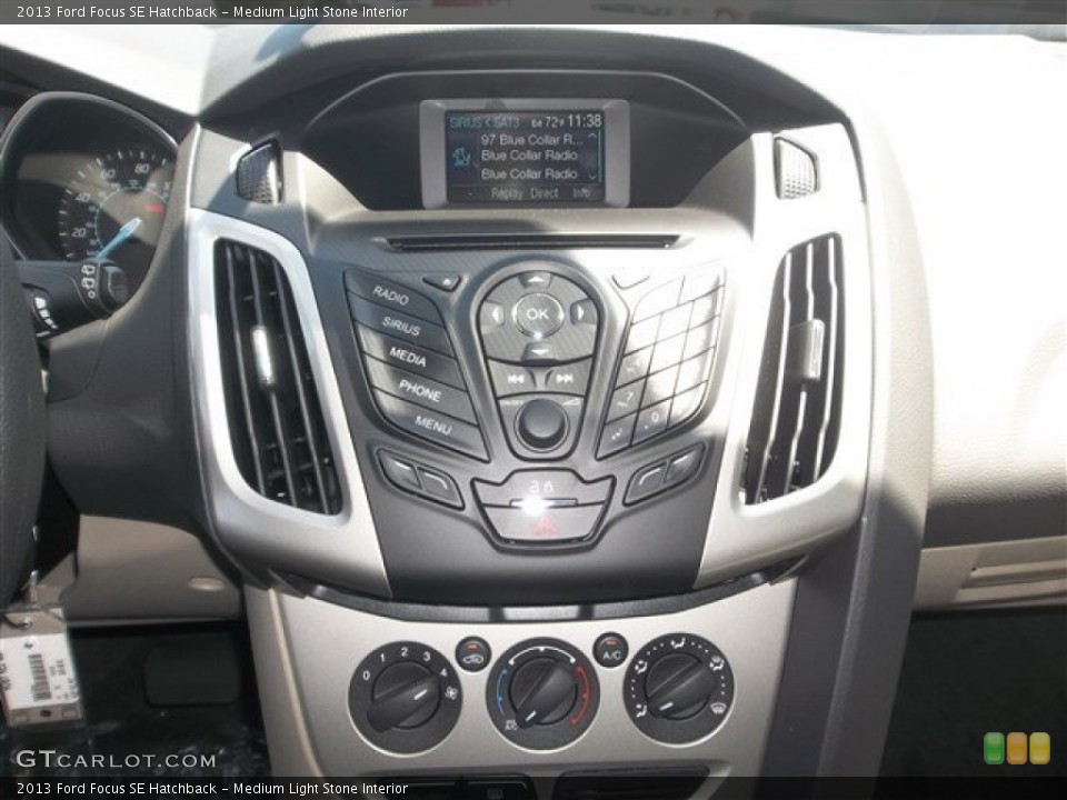 Medium Light Stone Interior Controls for the 2013 Ford Focus SE Hatchback #80847565
