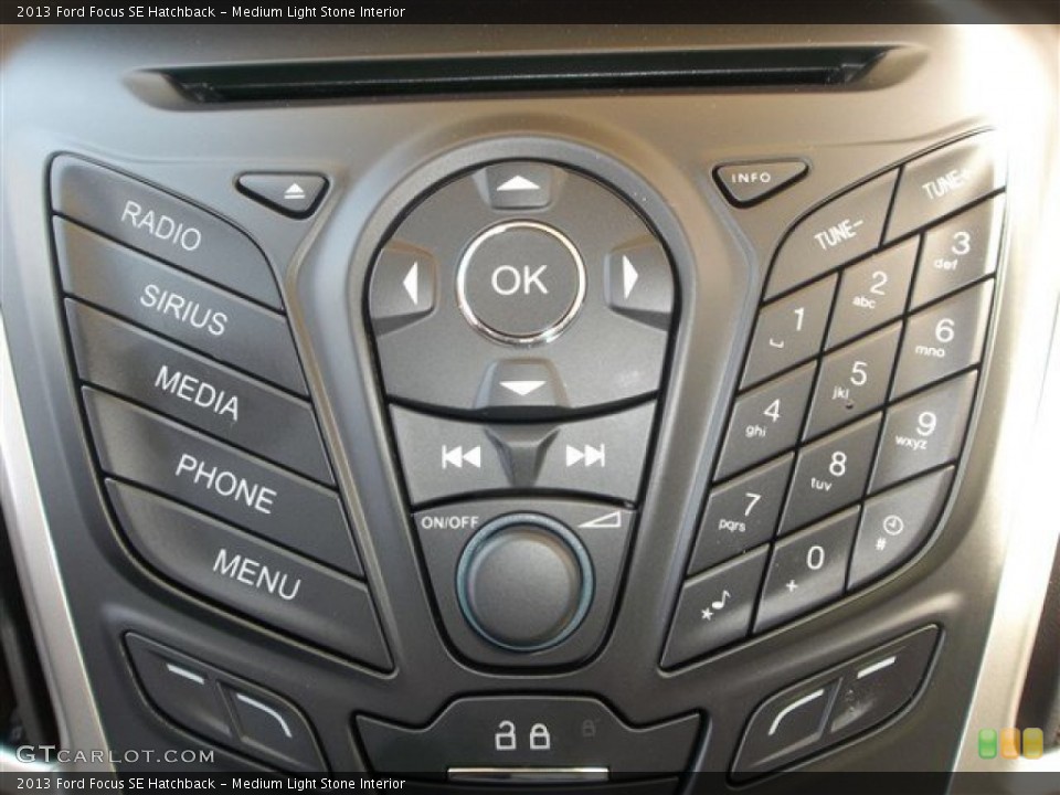 Medium Light Stone Interior Controls for the 2013 Ford Focus SE Hatchback #80847610