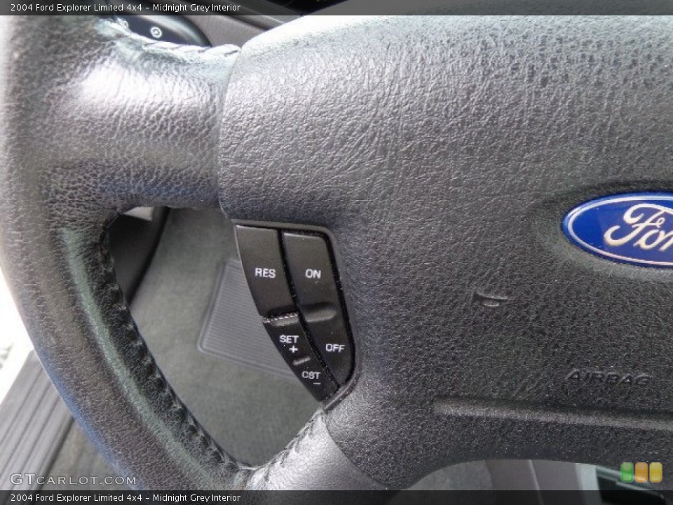 Midnight Grey Interior Controls for the 2004 Ford Explorer Limited 4x4 #80869828