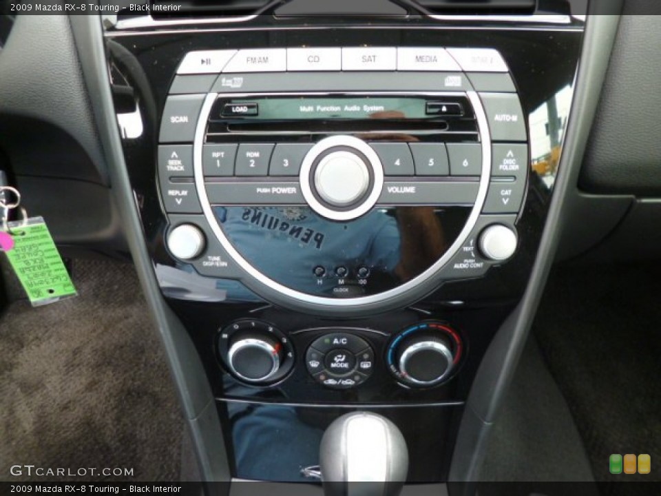 Black Interior Controls for the 2009 Mazda RX-8 Touring #80917345