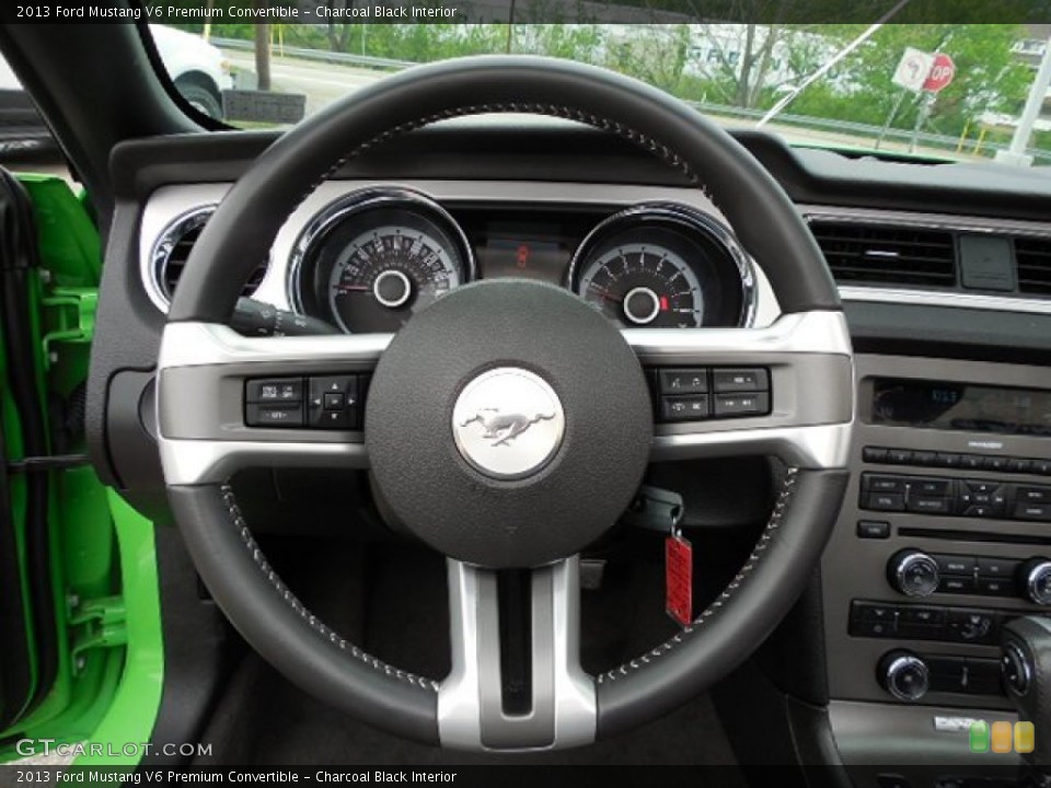 Charcoal Black Interior Steering Wheel for the 2013 Ford Mustang V6 Premium Convertible #80921268