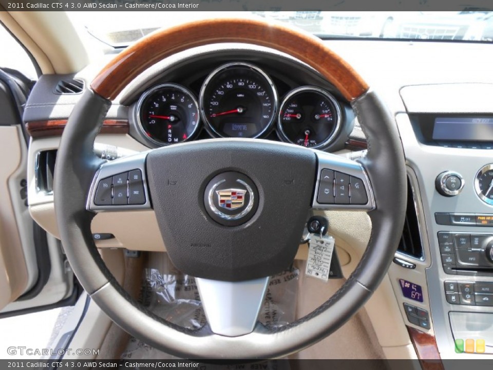 Cashmere/Cocoa Interior Steering Wheel for the 2011 Cadillac CTS 4 3.0 AWD Sedan #80921396