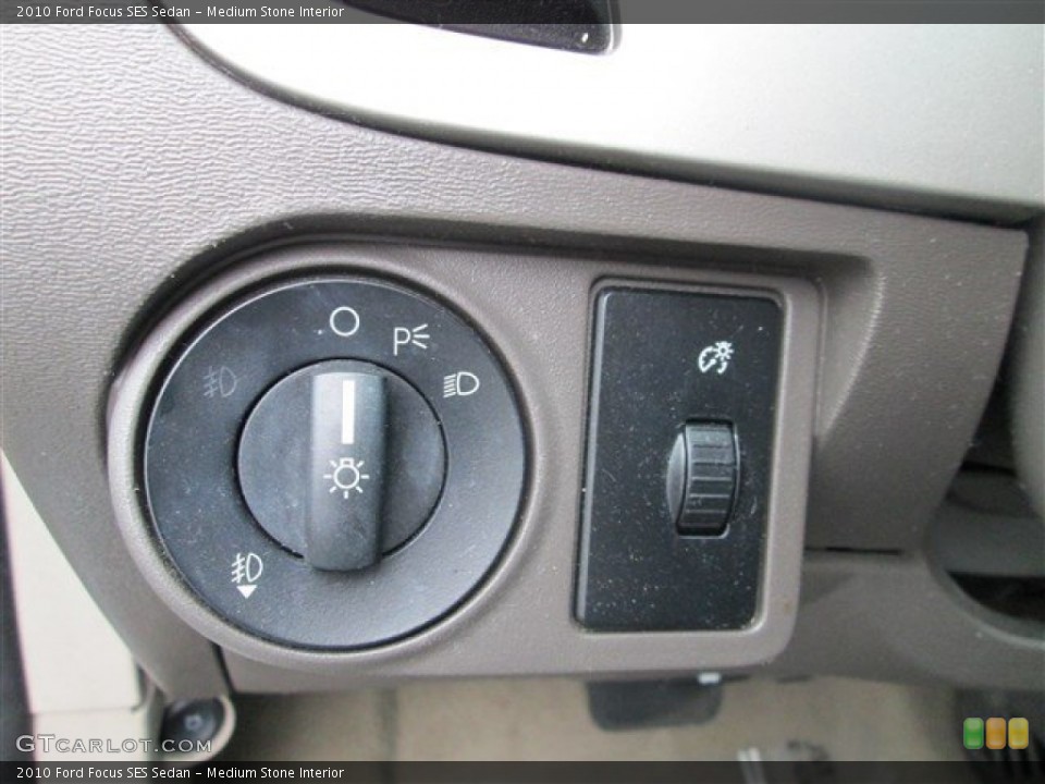 Medium Stone Interior Controls for the 2010 Ford Focus SES Sedan #80931234