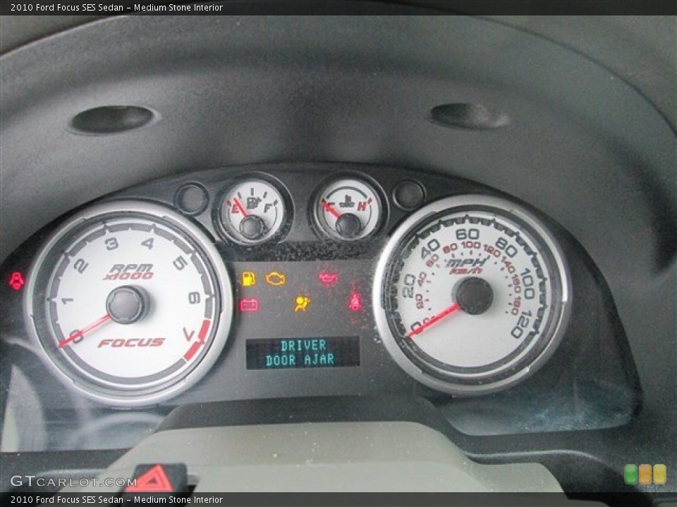 Medium Stone Interior Gauges for the 2010 Ford Focus SES Sedan #80931255
