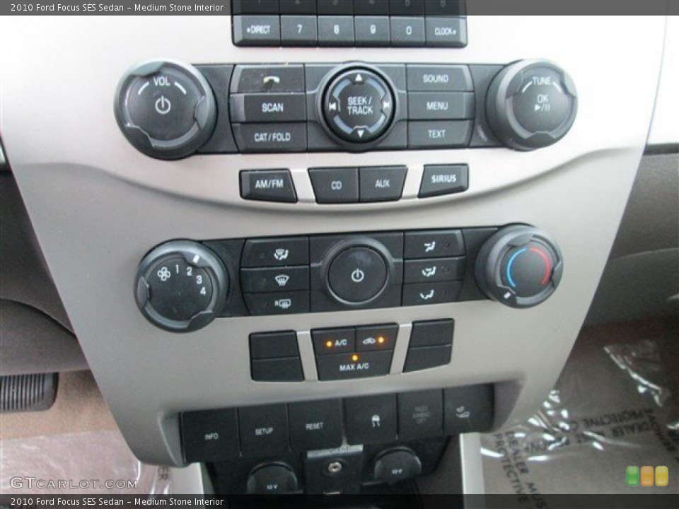Medium Stone Interior Controls for the 2010 Ford Focus SES Sedan #80931290