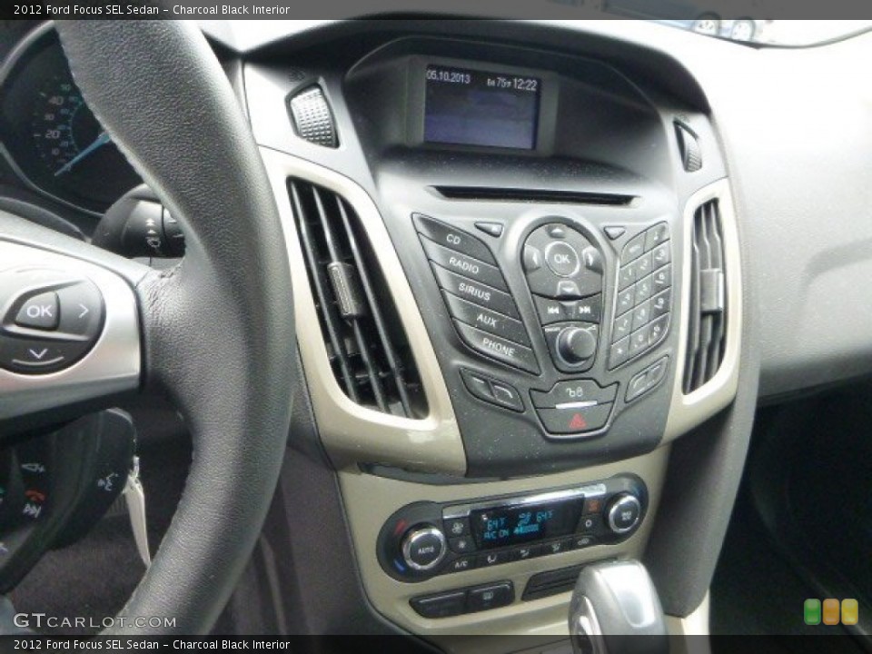 Charcoal Black Interior Controls for the 2012 Ford Focus SEL Sedan #80934303