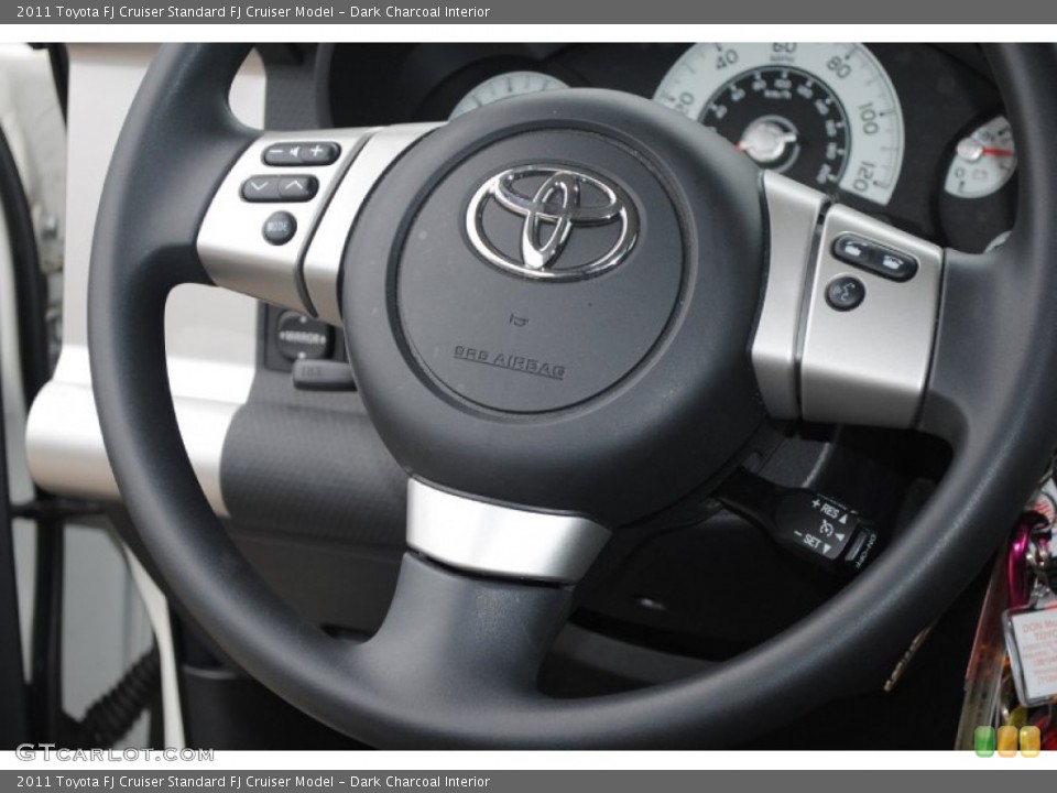 Dark Charcoal Interior Steering Wheel for the 2011 Toyota FJ Cruiser  #80943859