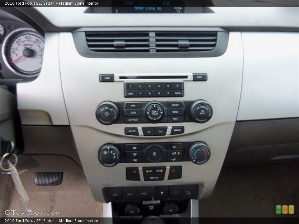 Medium Stone Interior Controls for the 2010 Ford Focus SEL Sedan #80955553