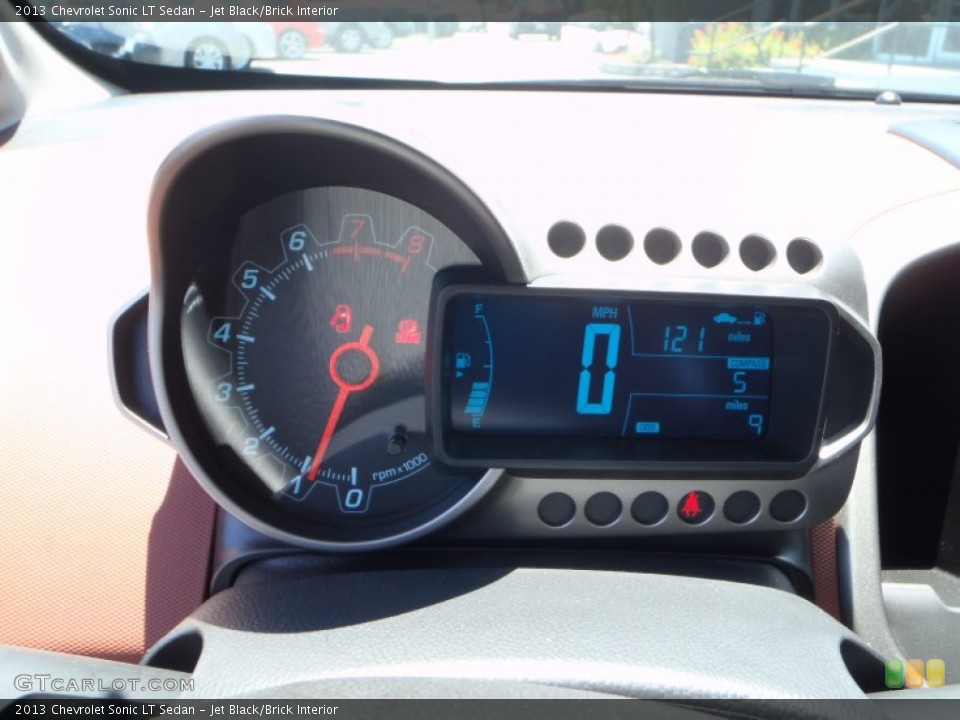 Jet Black/Brick Interior Gauges for the 2013 Chevrolet Sonic LT Sedan #80980121