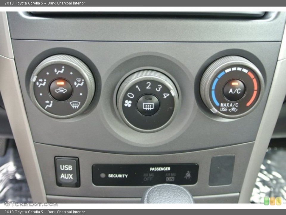 Dark Charcoal Interior Controls for the 2013 Toyota Corolla S #80981609
