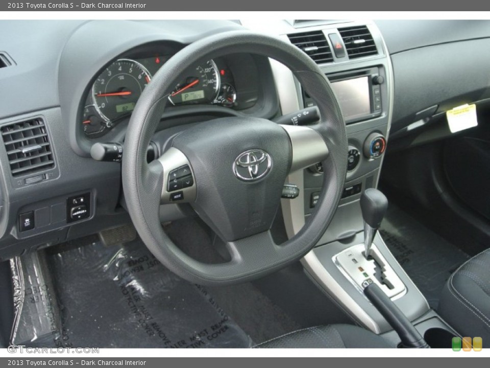 Dark Charcoal Interior Steering Wheel for the 2013 Toyota Corolla S #80981845