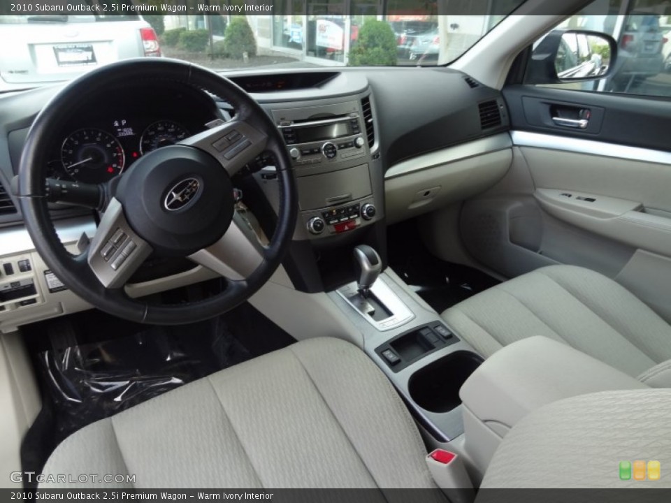 Warm Ivory Interior Dashboard for the 2010 Subaru Outback 2.5i Premium Wagon #80987798