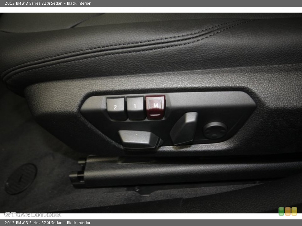 Black Interior Controls for the 2013 BMW 3 Series 320i Sedan #81000778