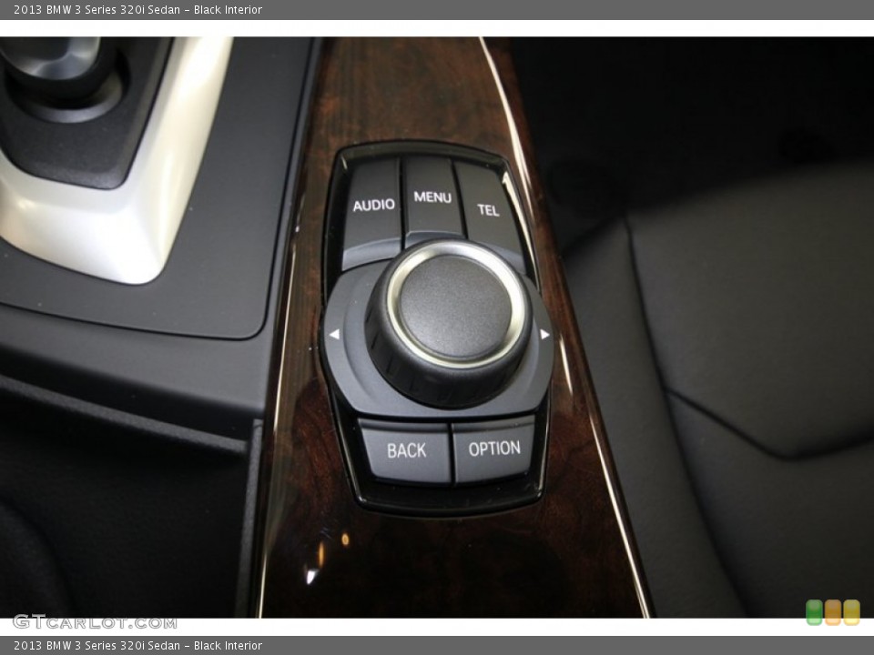 Black Interior Controls for the 2013 BMW 3 Series 320i Sedan #81000866