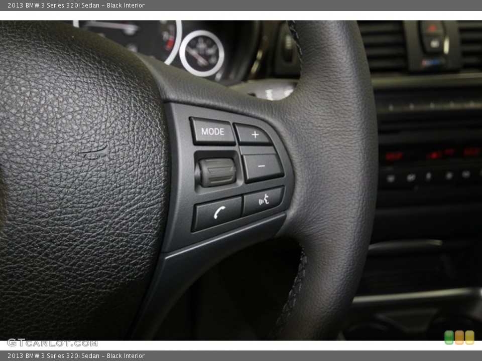 Black Interior Controls for the 2013 BMW 3 Series 320i Sedan #81000917