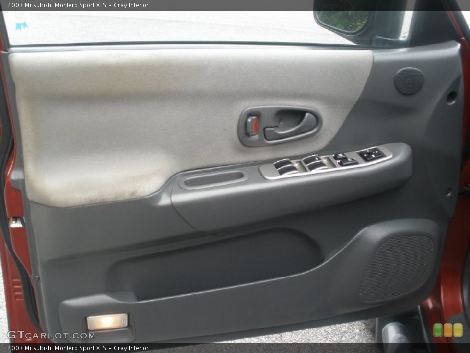Gray Interior Door Panel for the 2003 Mitsubishi Montero Sport XLS #81001054