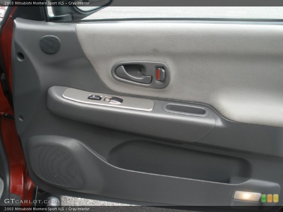 Gray Interior Door Panel for the 2003 Mitsubishi Montero Sport XLS #81001328
