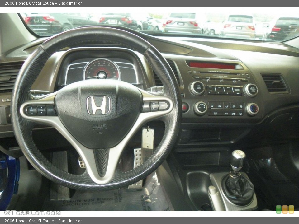 Black Interior Steering Wheel for the 2006 Honda Civic Si Coupe #81015558
