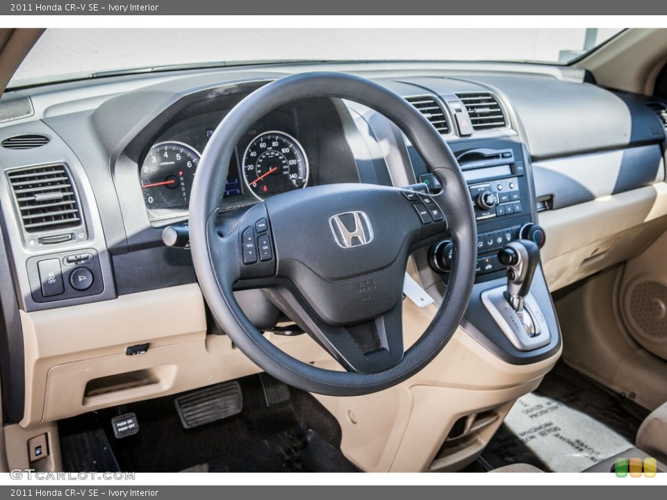 Ivory Interior Dashboard for the 2011 Honda CR-V SE #81023703