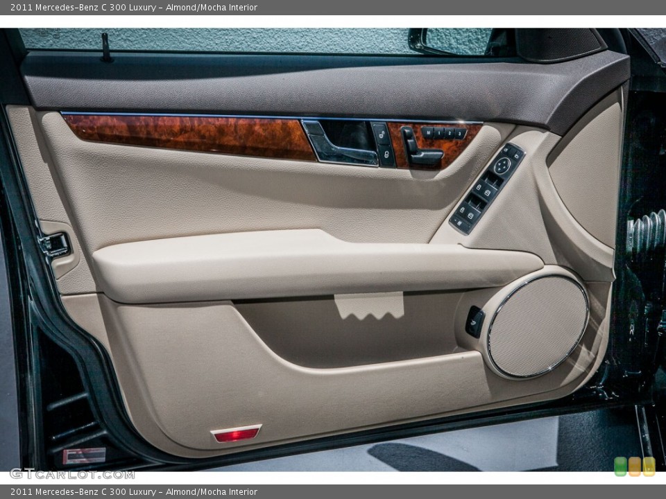 Almond/Mocha Interior Door Panel for the 2011 Mercedes-Benz C 300 Luxury #81028455