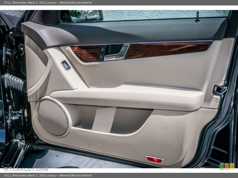 Almond/Mocha Interior Door Panel for the 2011 Mercedes-Benz C 300 Luxury #81028656