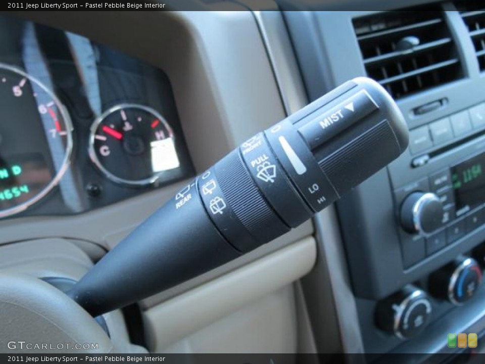 Pastel Pebble Beige Interior Controls for the 2011 Jeep Liberty Sport #81045908