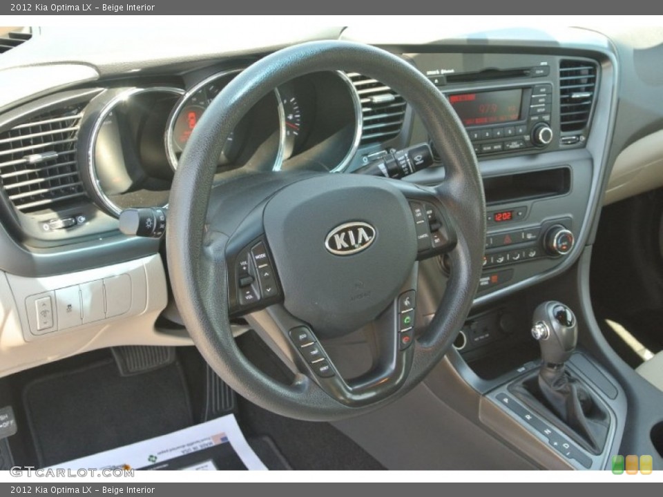 Beige Interior Dashboard for the 2012 Kia Optima LX #81091913