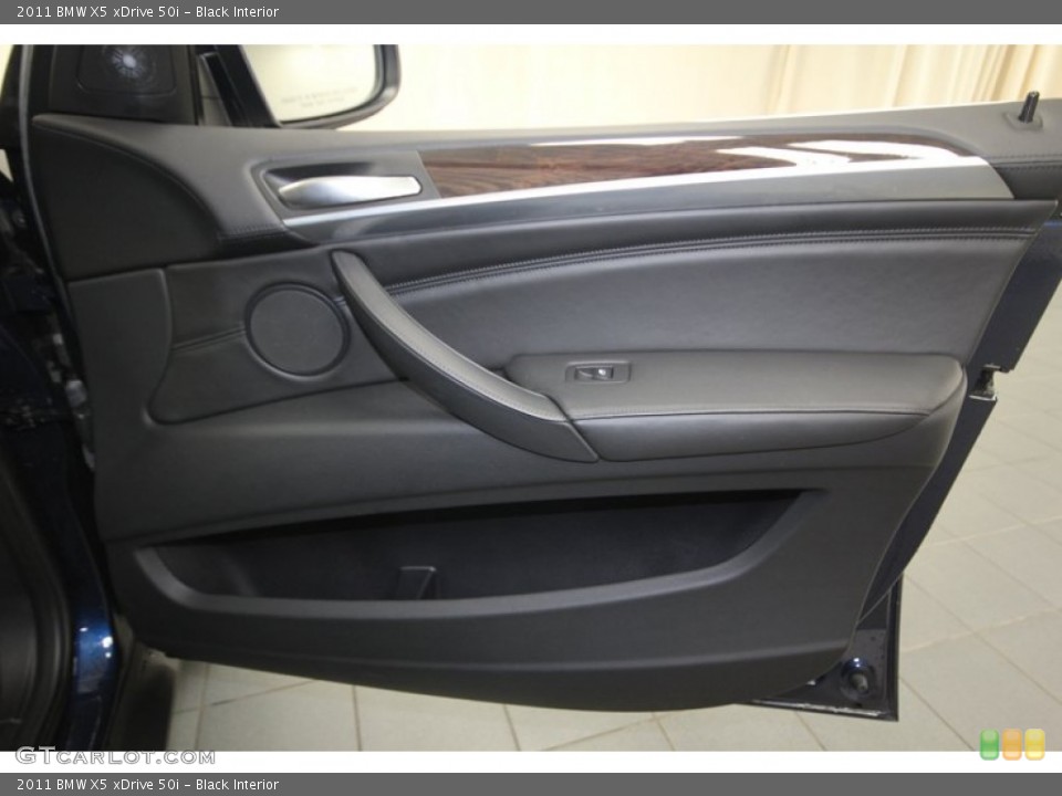 Black Interior Door Panel for the 2011 BMW X5 xDrive 50i #81118616