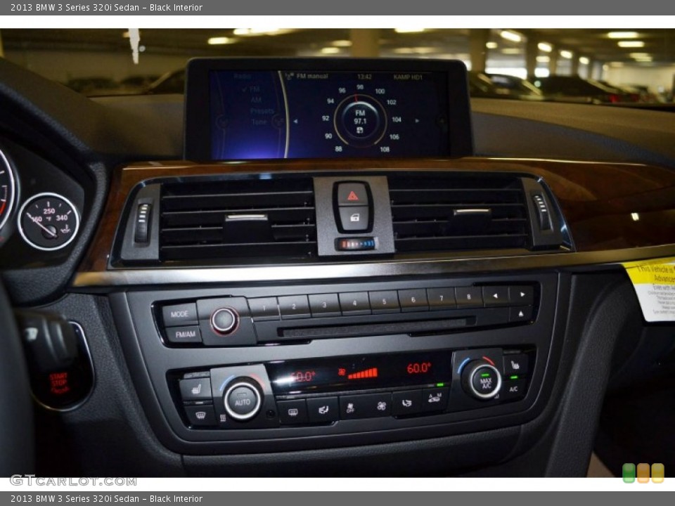 Black Interior Controls for the 2013 BMW 3 Series 320i Sedan #81124689