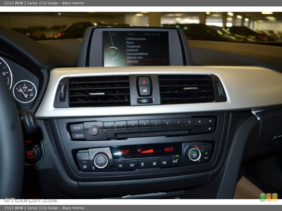 Black Interior Controls for the 2013 BMW 3 Series 320i Sedan #81124751