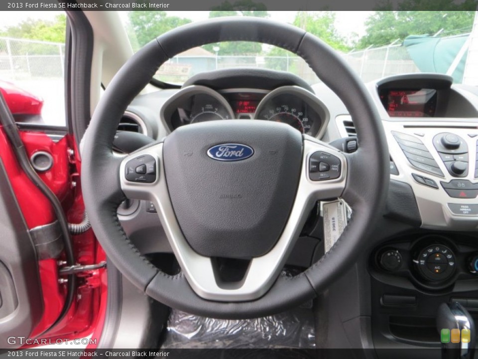 Charcoal Black Interior Steering Wheel for the 2013 Ford Fiesta SE Hatchback #81134562