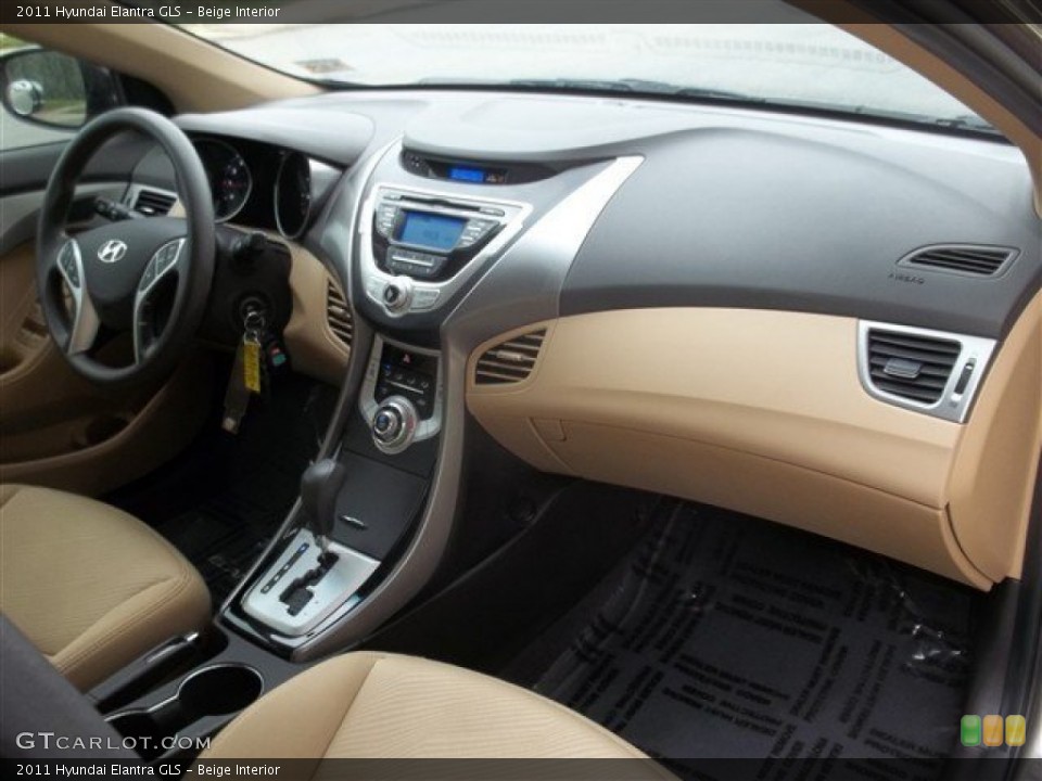 Beige Interior Dashboard for the 2011 Hyundai Elantra GLS #81138557