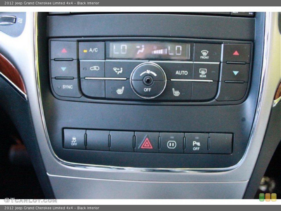 Black Interior Controls for the 2012 Jeep Grand Cherokee Limited 4x4 #81149464