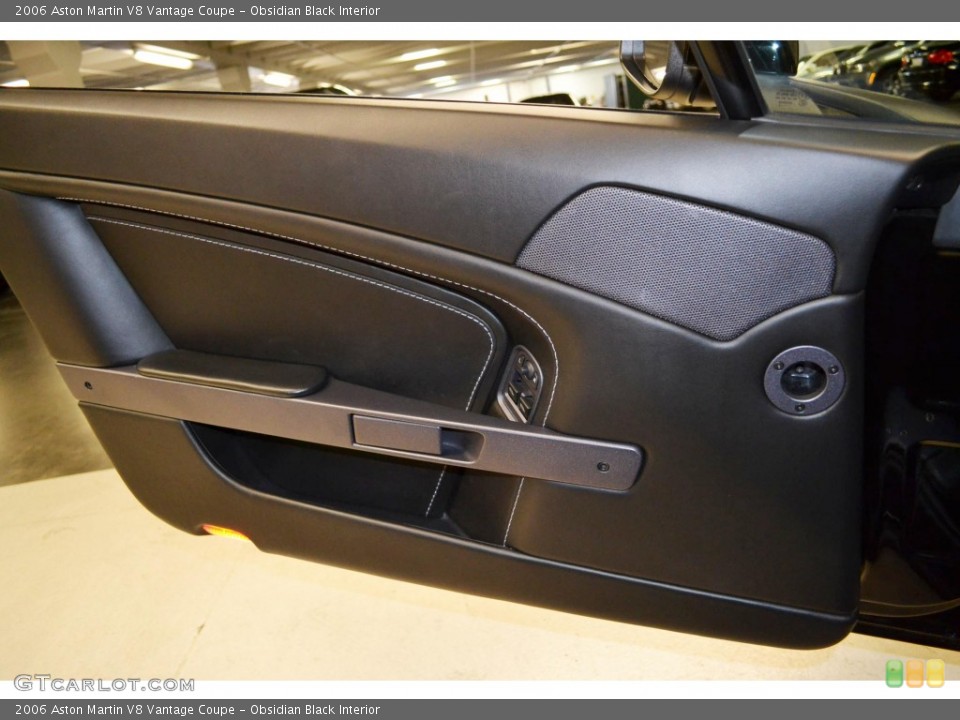 Obsidian Black Interior Door Panel for the 2006 Aston Martin V8 Vantage Coupe #81153409