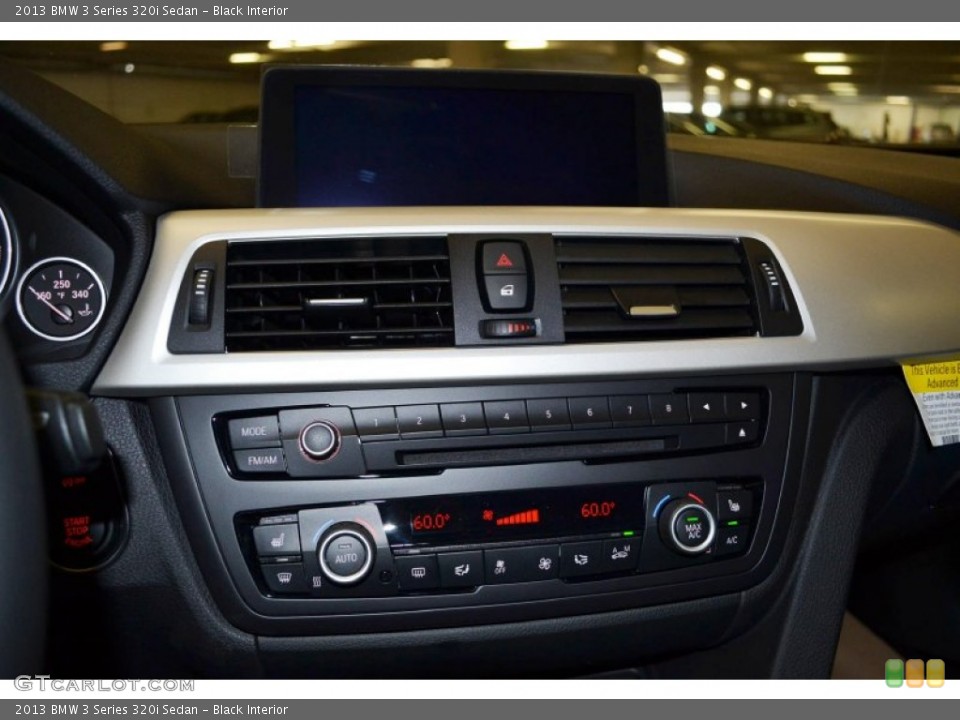 Black Interior Controls for the 2013 BMW 3 Series 320i Sedan #81155652