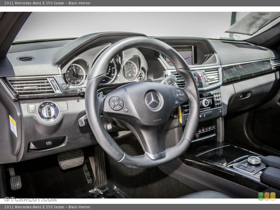 Black Interior Dashboard for the 2011 Mercedes-Benz E 350 Sedan #81164481