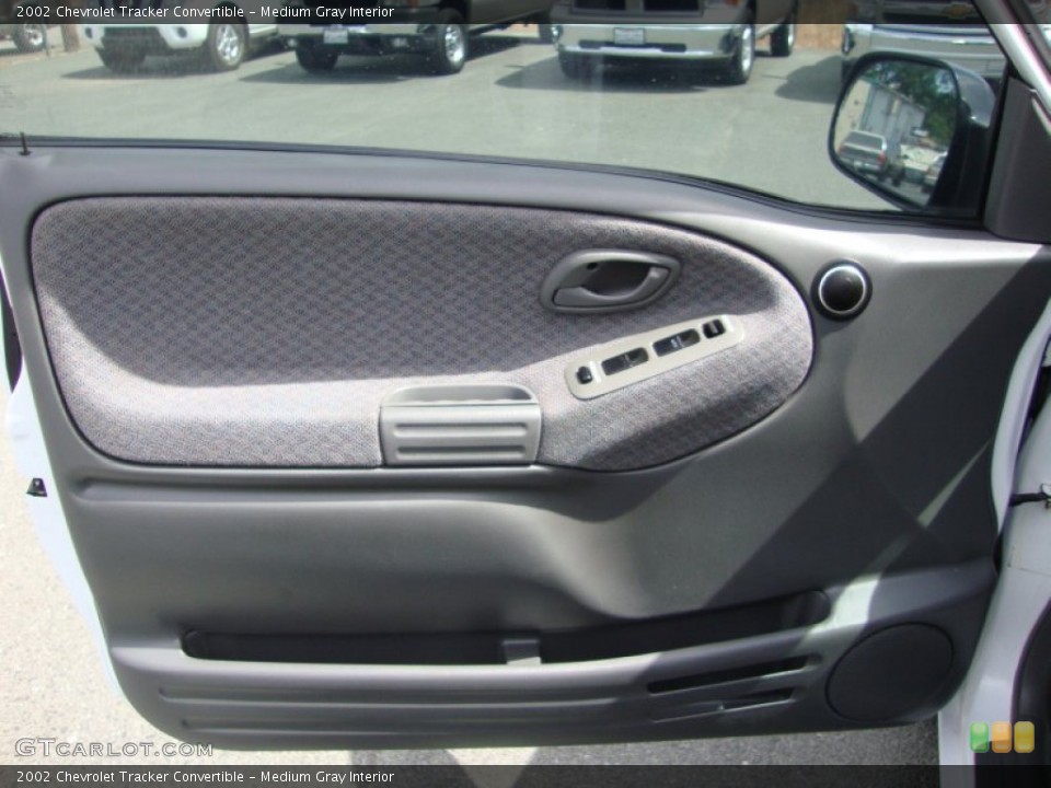 Medium Gray Interior Door Panel for the 2002 Chevrolet Tracker Convertible #81167430