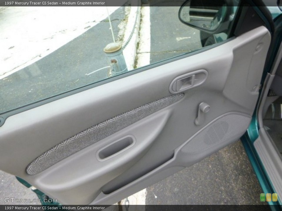 Medium Graphite Interior Door Panel for the 1997 Mercury Tracer GS Sedan #81188091