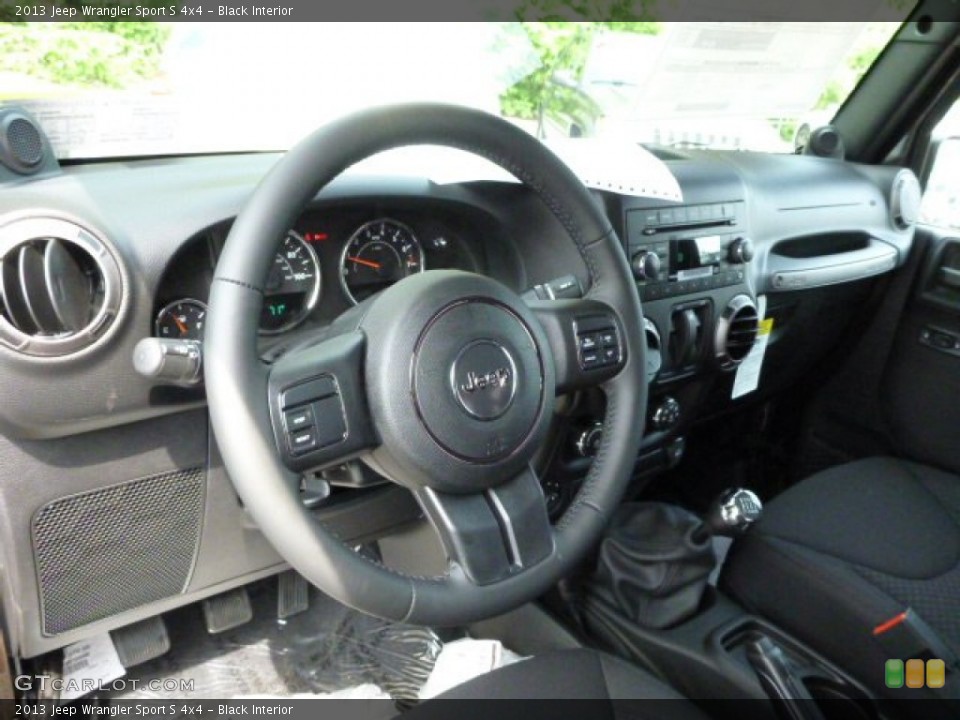 Black Interior Steering Wheel for the 2013 Jeep Wrangler Sport S 4x4 #81192681