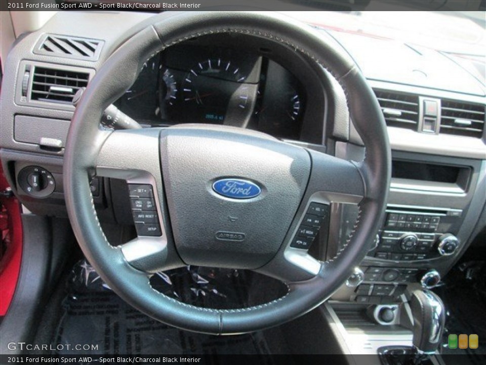 Sport Black/Charcoal Black Interior Steering Wheel for the 2011 Ford Fusion Sport AWD #81230696