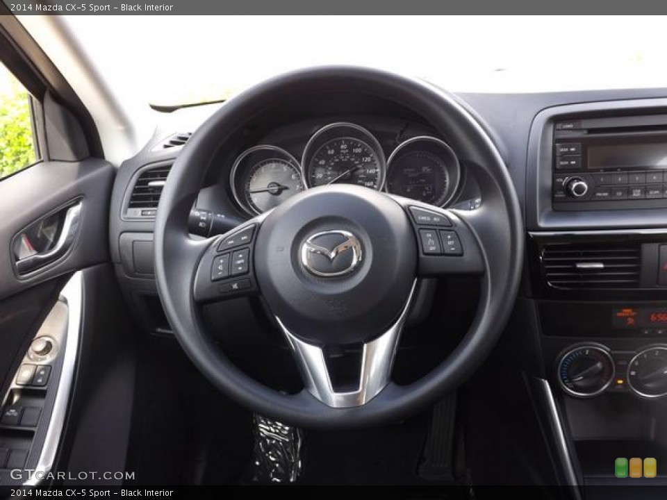 Black Interior Steering Wheel for the 2014 Mazda CX-5 Sport #81236758