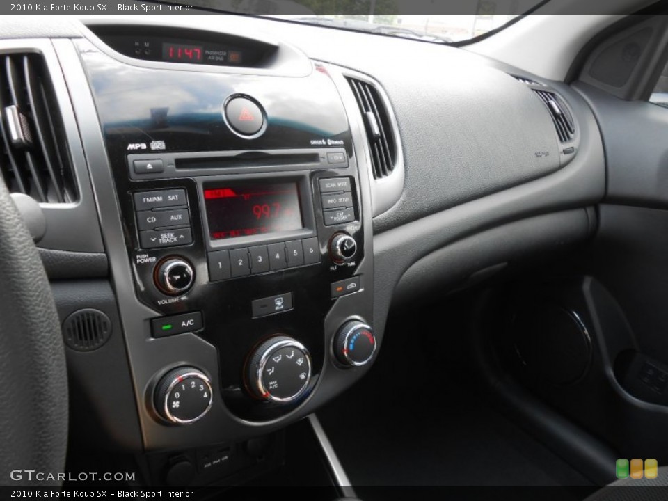 Black Sport Interior Controls for the 2010 Kia Forte Koup SX #81250958