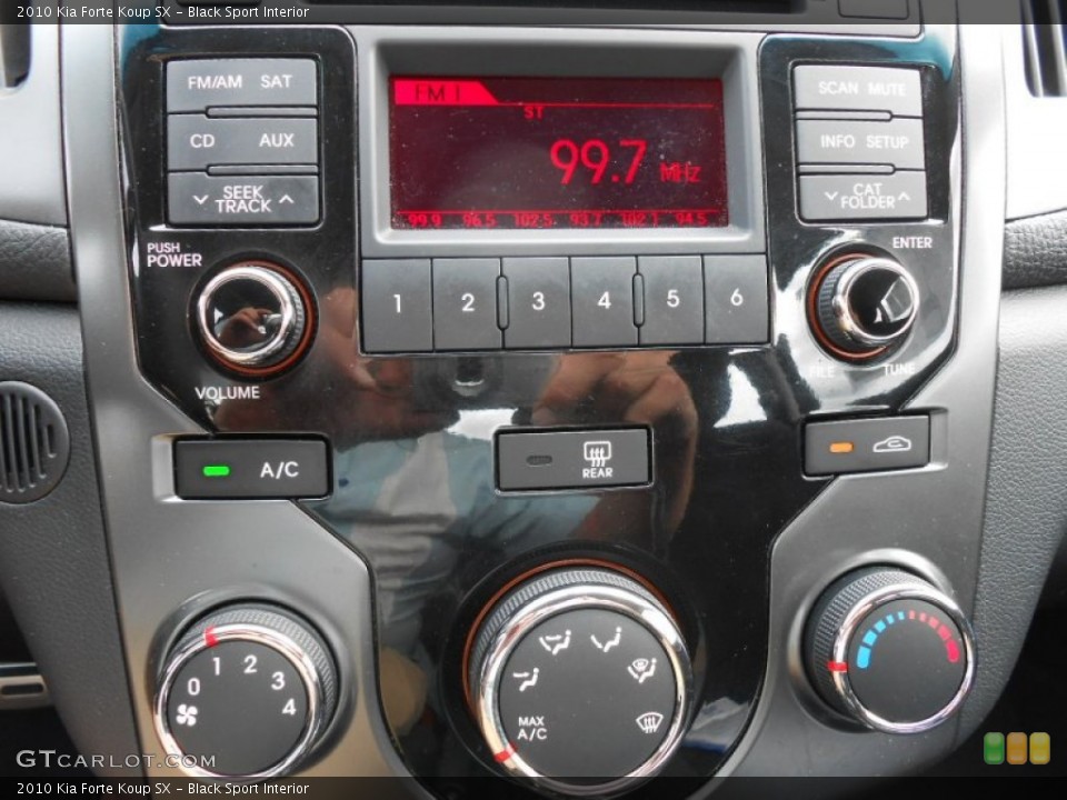 Black Sport Interior Controls for the 2010 Kia Forte Koup SX #81250975