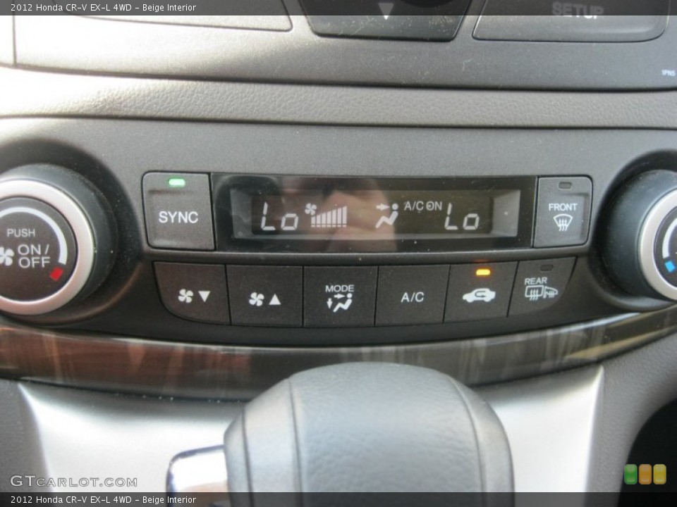 Beige Interior Controls for the 2012 Honda CR-V EX-L 4WD #81261250