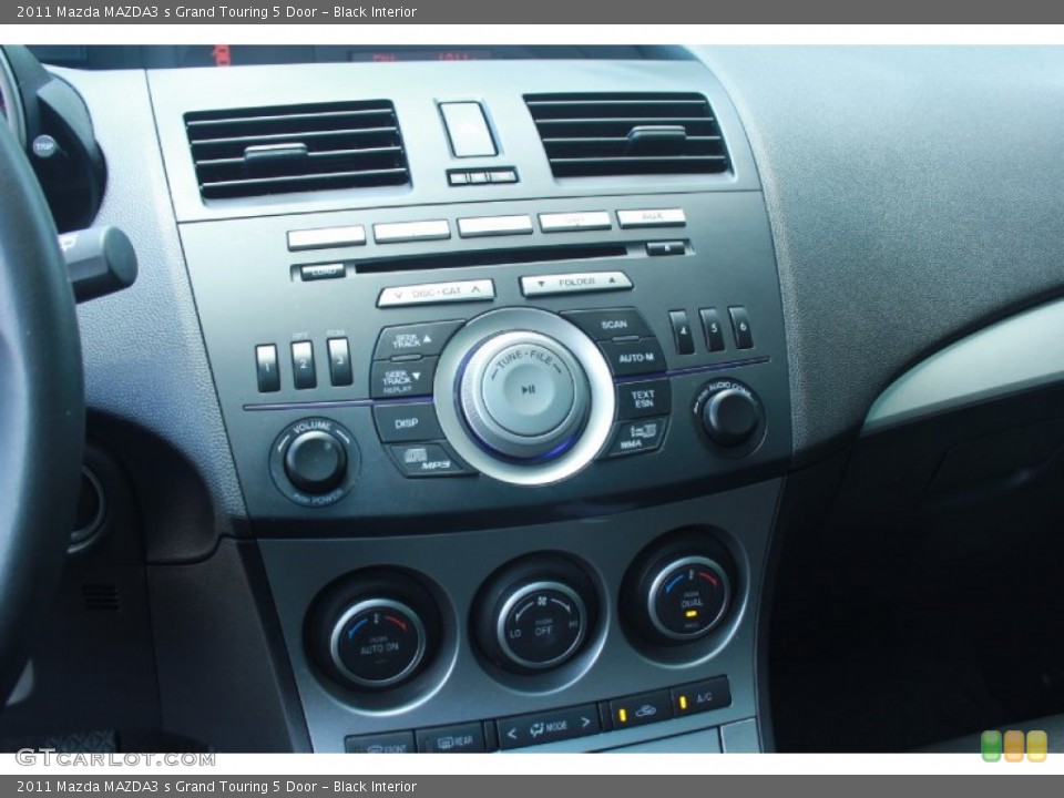 Black Interior Controls for the 2011 Mazda MAZDA3 s Grand Touring 5 Door #81270868