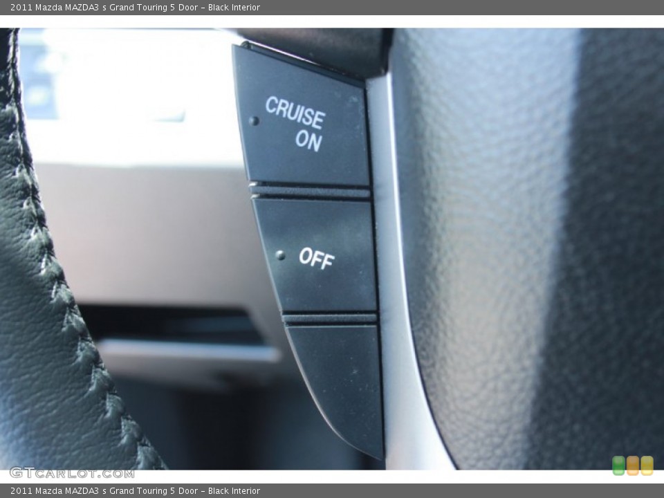 Black Interior Controls for the 2011 Mazda MAZDA3 s Grand Touring 5 Door #81270952