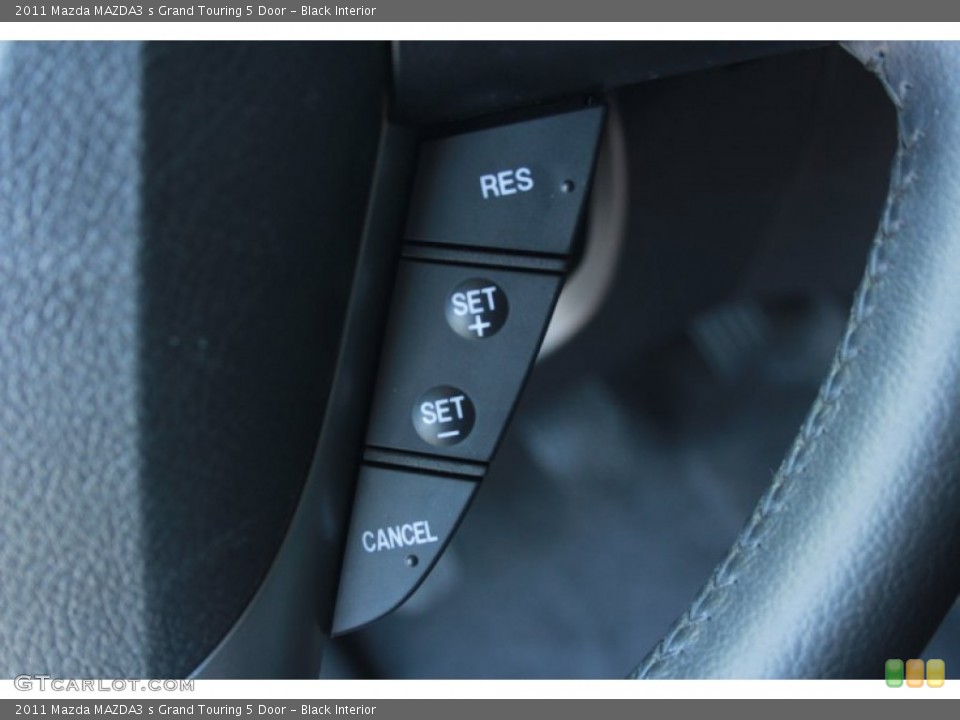 Black Interior Controls for the 2011 Mazda MAZDA3 s Grand Touring 5 Door #81270970