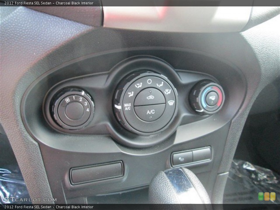 Charcoal Black Interior Controls for the 2012 Ford Fiesta SEL Sedan #81302579